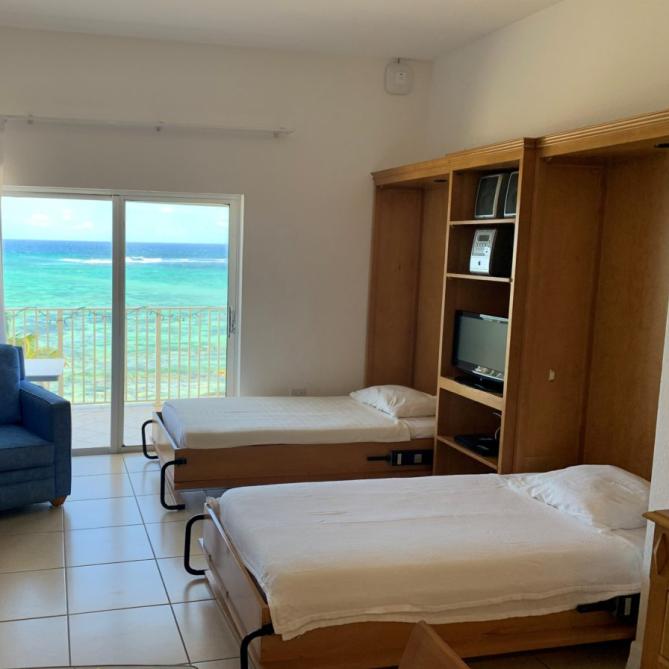 Murphy Beds (living room) with view to ocean